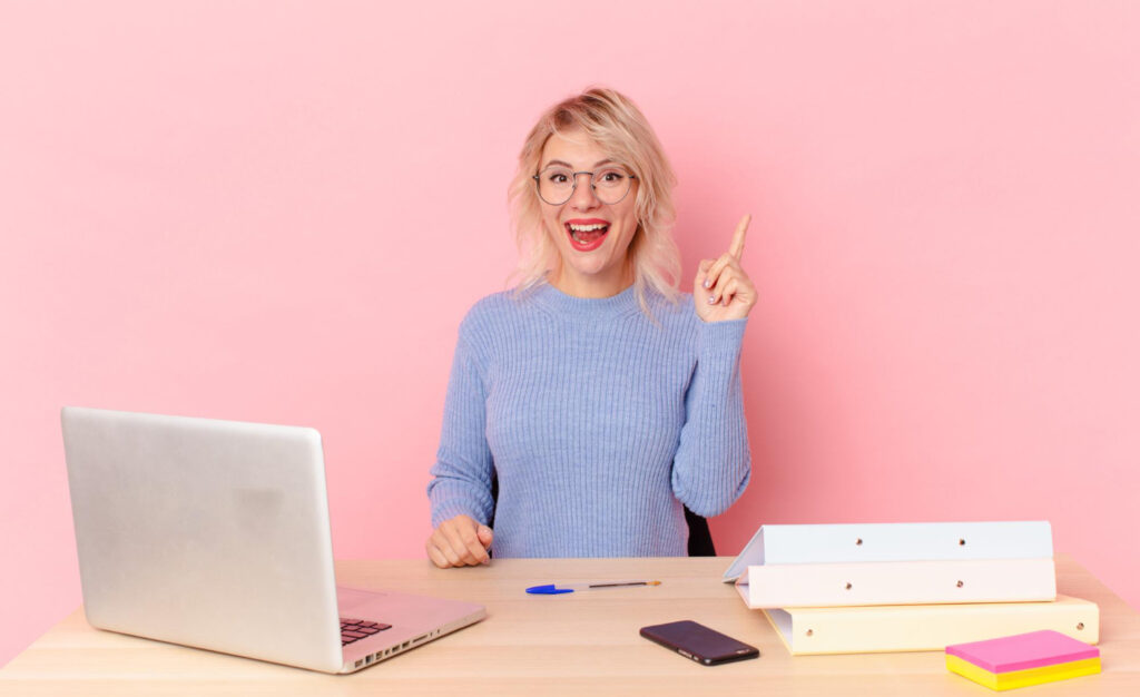 Woman reading blog looking happy.