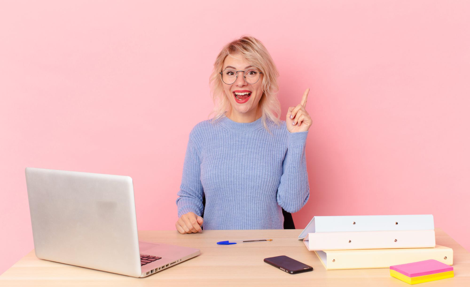 Woman reading blog looking happy.